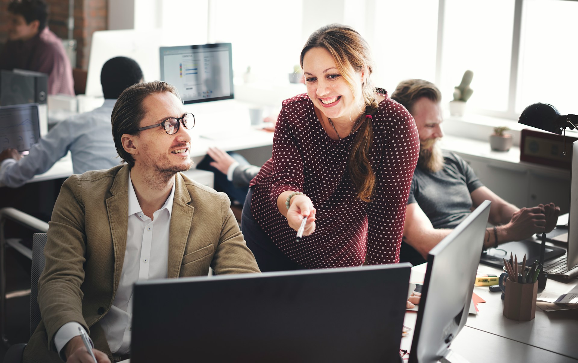 A woman talking to another person